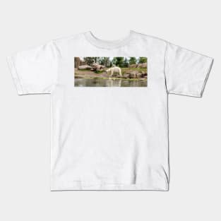 Polar bear walking by lake Kids T-Shirt